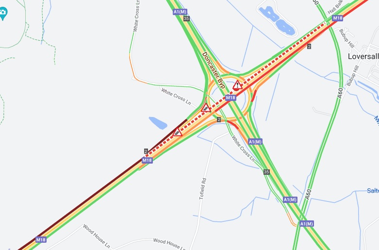 M18 in South Yorkshire near Doncaster closed with air ambulance on